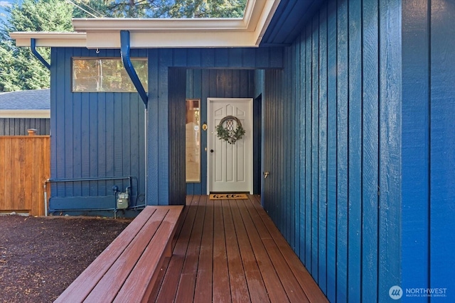 doorway to property with board and batten siding