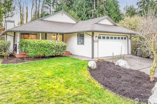 ranch-style home featuring a front yard, roof with shingles, concrete driveway, and an attached garage