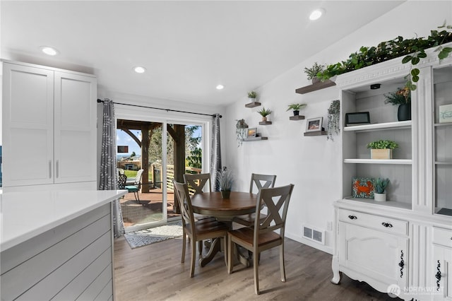 dining room featuring recessed lighting, visible vents, and light wood-style floors