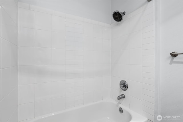 bathroom with shower / bathtub combination