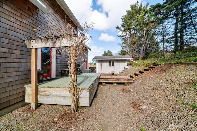 exterior space with an outbuilding and central air condition unit