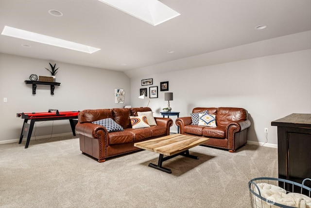 carpeted living room with recessed lighting, baseboards, and a skylight