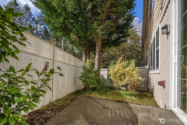 view of yard featuring a fenced backyard