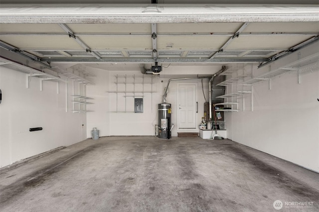 garage with a garage door opener, strapped water heater, and electric panel