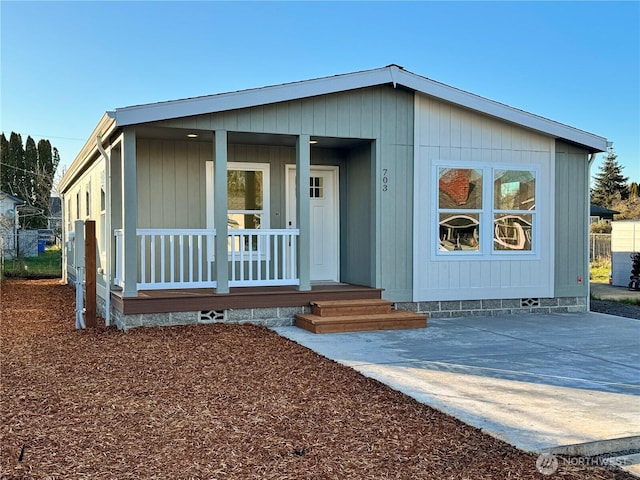 exterior space with covered porch and crawl space