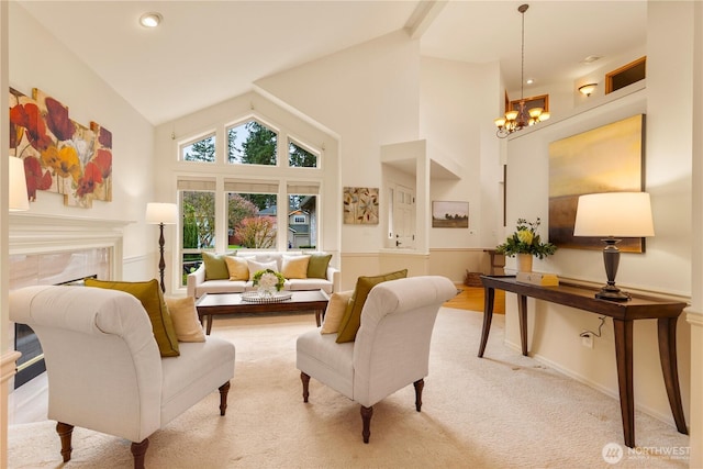 living area featuring a notable chandelier, high vaulted ceiling, recessed lighting, carpet flooring, and baseboards