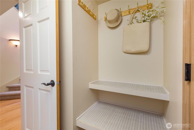 mudroom with wood finished floors