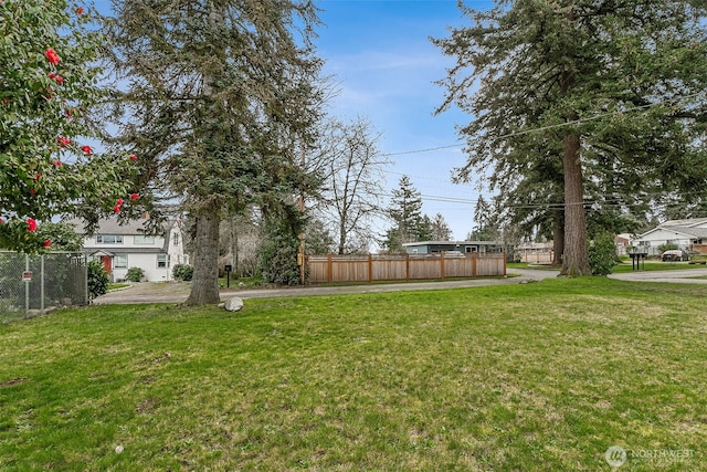 view of yard with fence