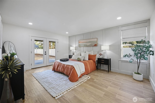 bedroom with light wood finished floors, baseboards, access to outside, french doors, and recessed lighting