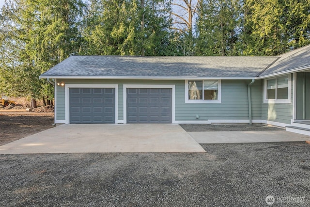 garage with driveway