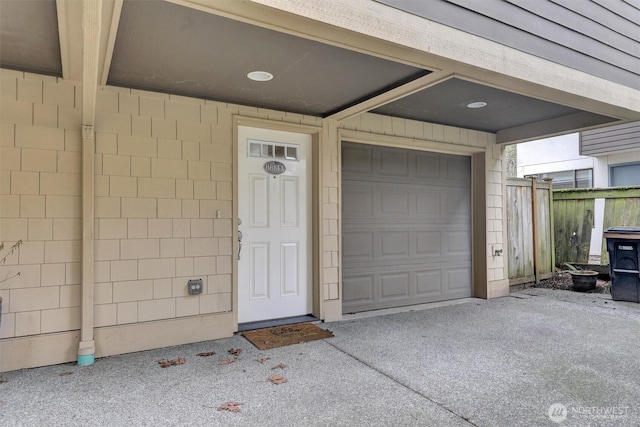 property entrance with a garage