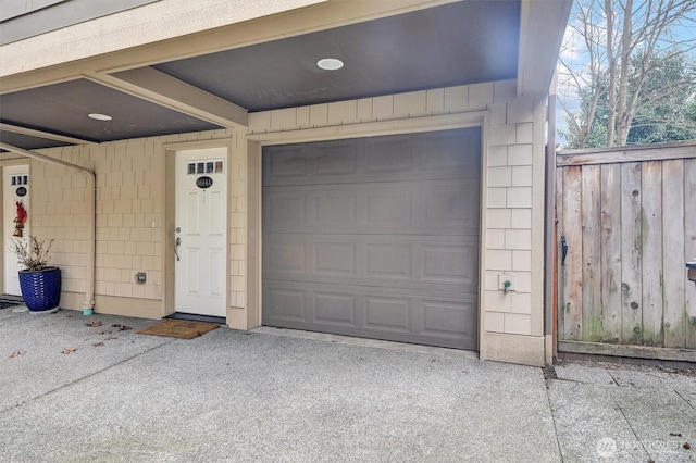 garage with fence