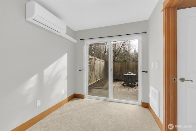 interior space with carpet floors, baseboards, visible vents, and an AC wall unit