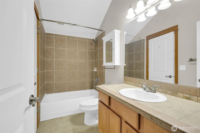 full bathroom featuring bathing tub / shower combination, toilet, tile patterned floors, vanity, and a notable chandelier