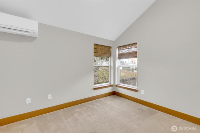 carpeted spare room with high vaulted ceiling, baseboards, and an AC wall unit