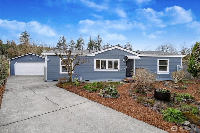 view of front of home with crawl space, a garage, and an outdoor structure