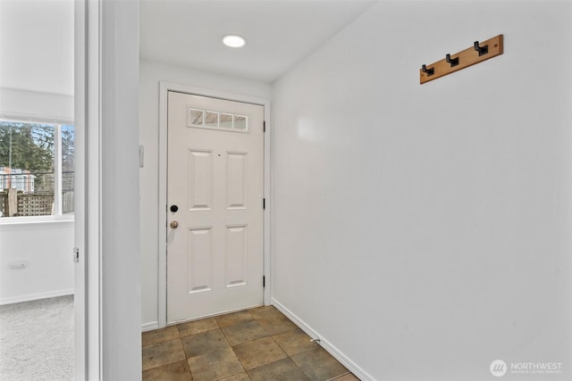 doorway with baseboards