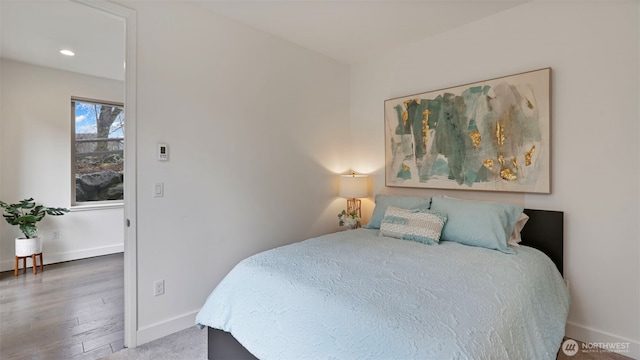 bedroom featuring recessed lighting and baseboards