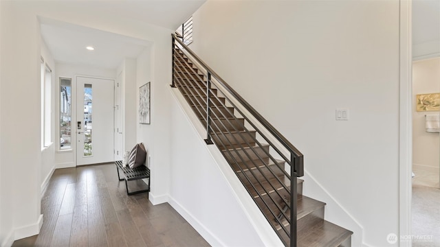 entryway featuring stairway, recessed lighting, dark wood finished floors, and baseboards