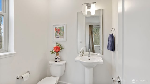 bathroom featuring toilet