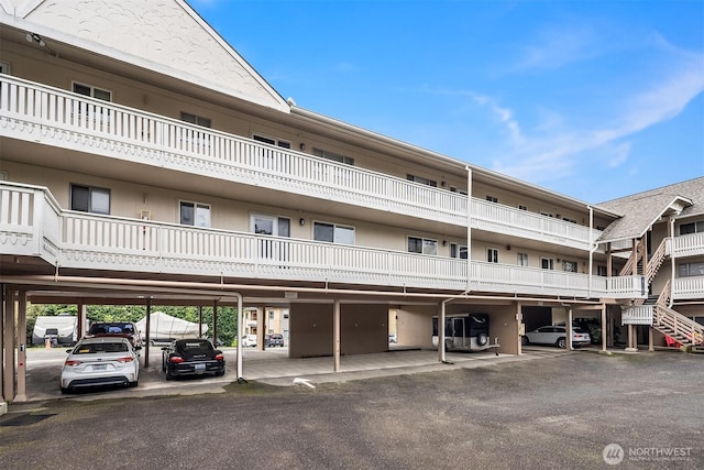 view of property with covered parking