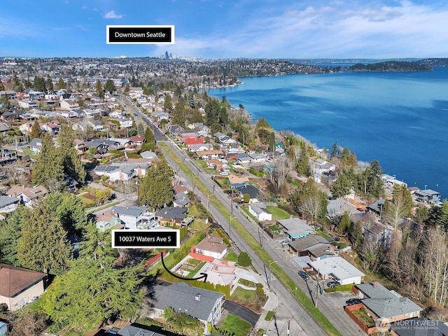 aerial view featuring a water view and a residential view