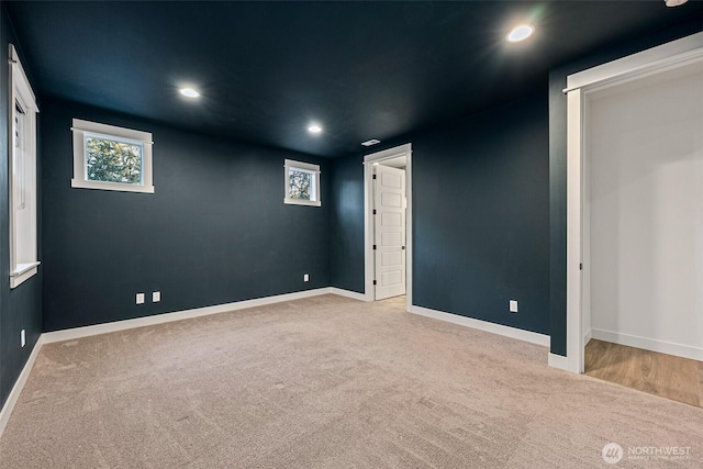 unfurnished room with recessed lighting, carpet flooring, and baseboards