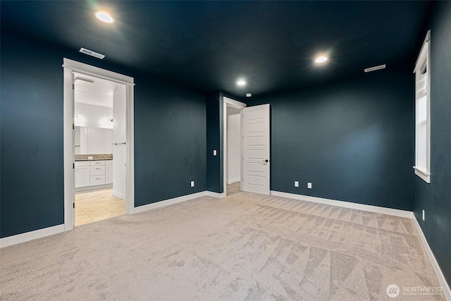 unfurnished room featuring recessed lighting, carpet flooring, and baseboards