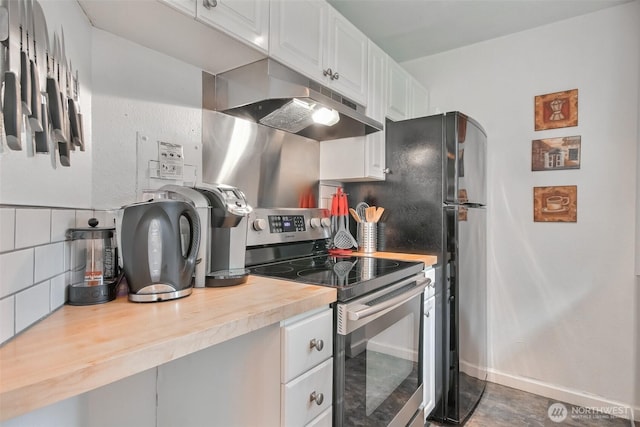 kitchen with stainless steel range with electric stovetop, under cabinet range hood, tasteful backsplash, white cabinetry, and wooden counters