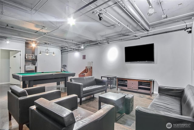 recreation room featuring washer / dryer, pool table, and baseboards