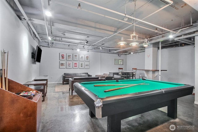 recreation room with concrete flooring and pool table