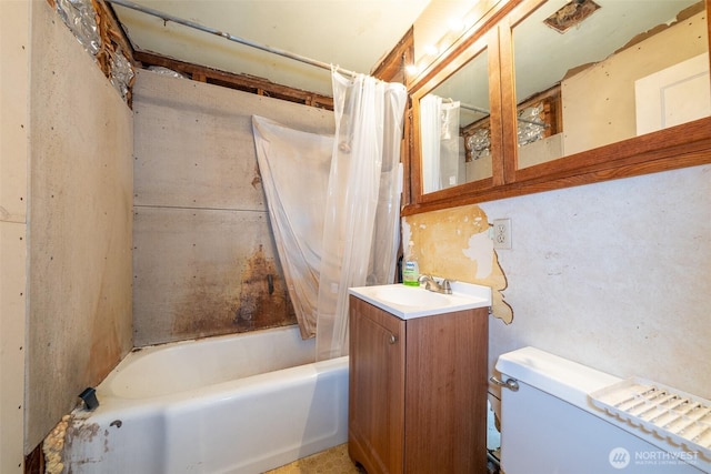 bathroom featuring shower / tub combo with curtain, toilet, and vanity