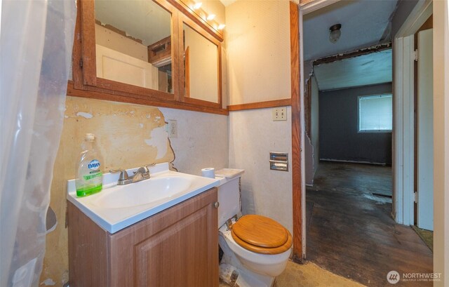 half bath with toilet and vanity