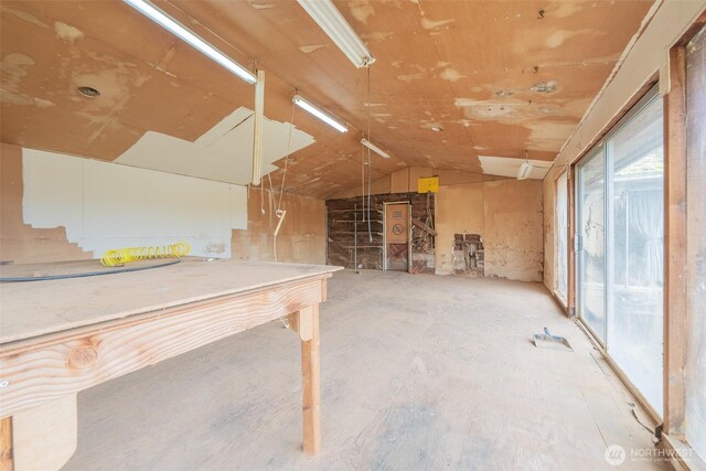 interior space featuring vaulted ceiling