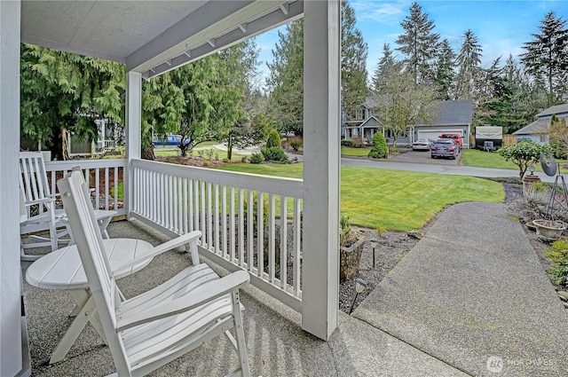 view of patio featuring a porch