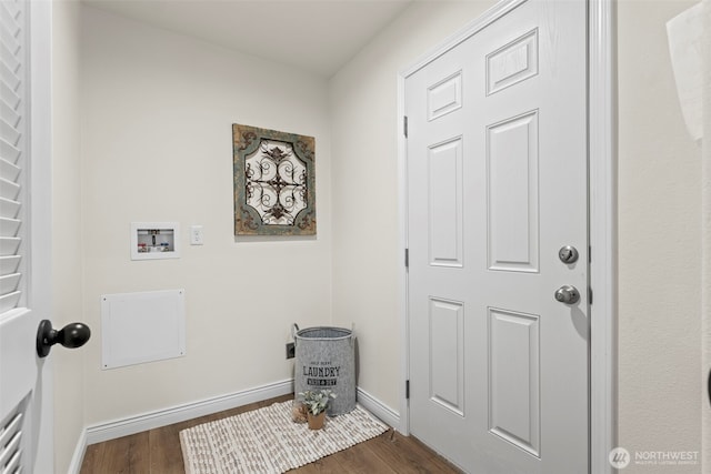 washroom with laundry area, hookup for a washing machine, baseboards, and dark wood-type flooring