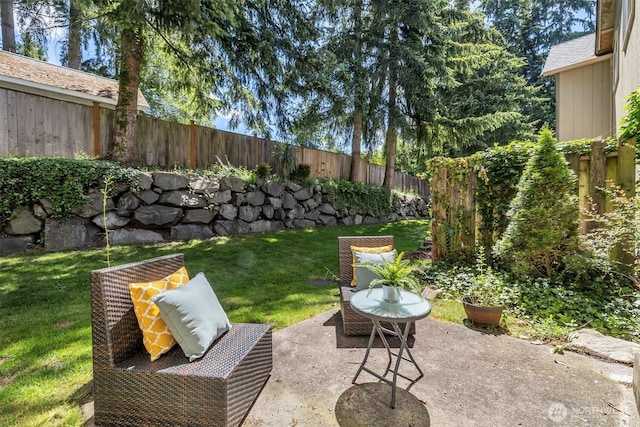 view of patio featuring a fenced backyard