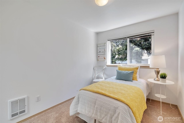 bedroom with visible vents, carpet floors, and baseboards