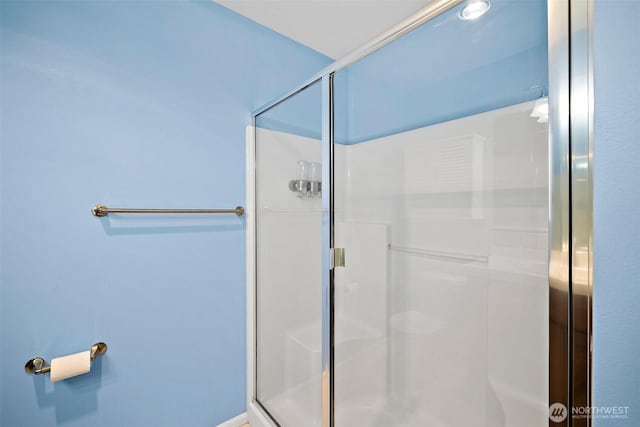 full bathroom with a stall shower