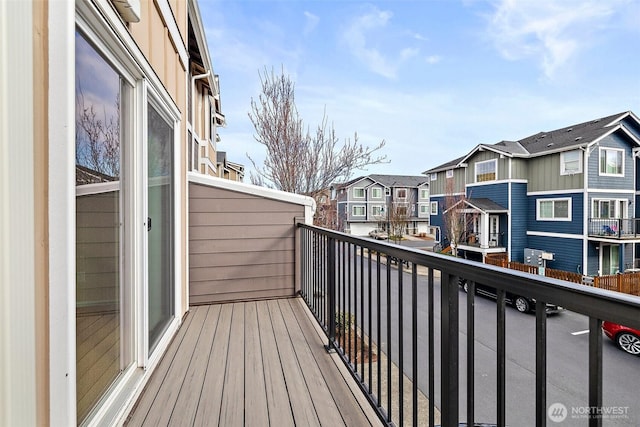 balcony featuring a residential view