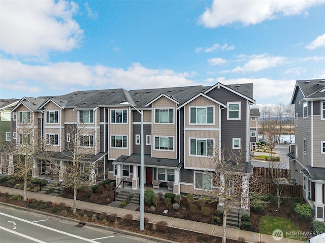 view of front of property featuring a residential view and board and batten siding