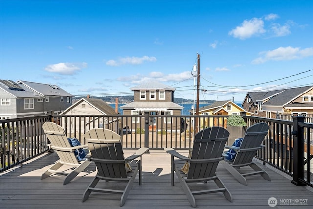 wooden deck featuring a residential view