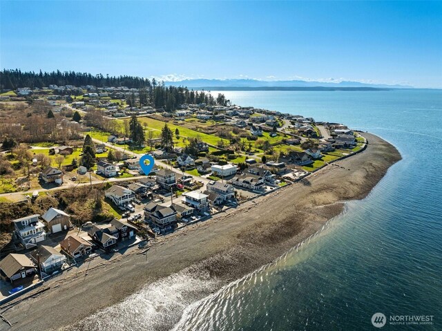 bird's eye view with a water view and a residential view