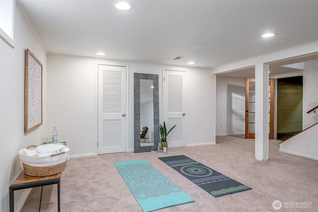 workout area with visible vents, recessed lighting, baseboards, and carpet