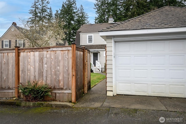 garage with fence