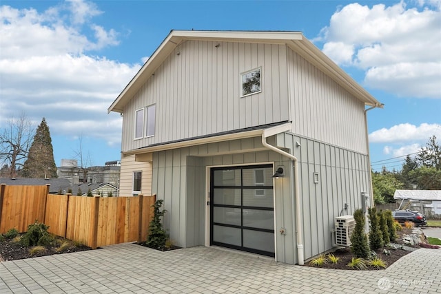 garage with fence