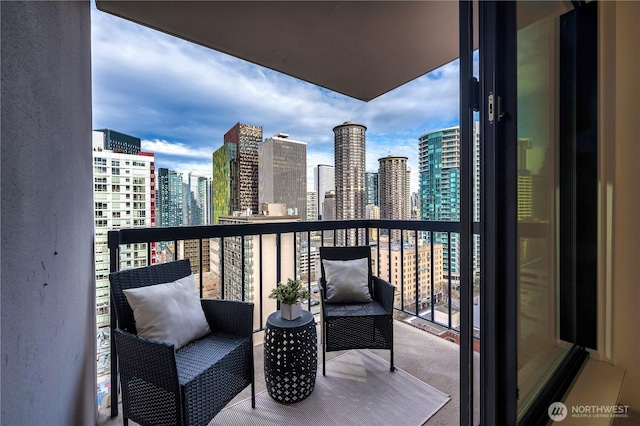 balcony featuring a view of city