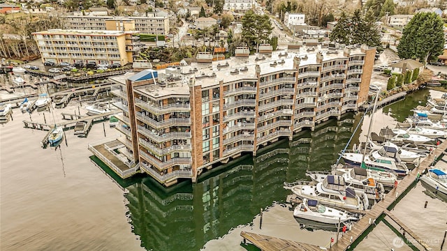 drone / aerial view with a view of city and a water view