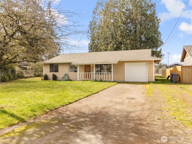 ranch-style house featuring driveway, a porch, an attached garage, fence, and a front lawn