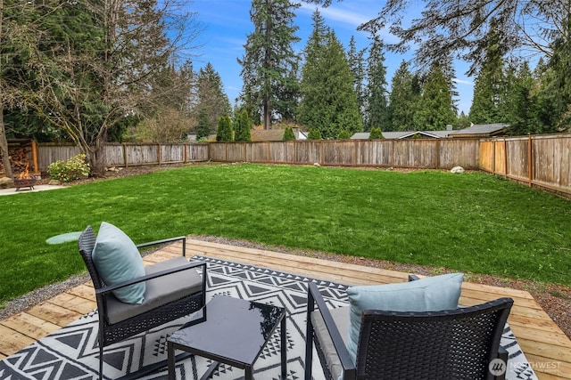 view of yard featuring a patio area and a fenced backyard